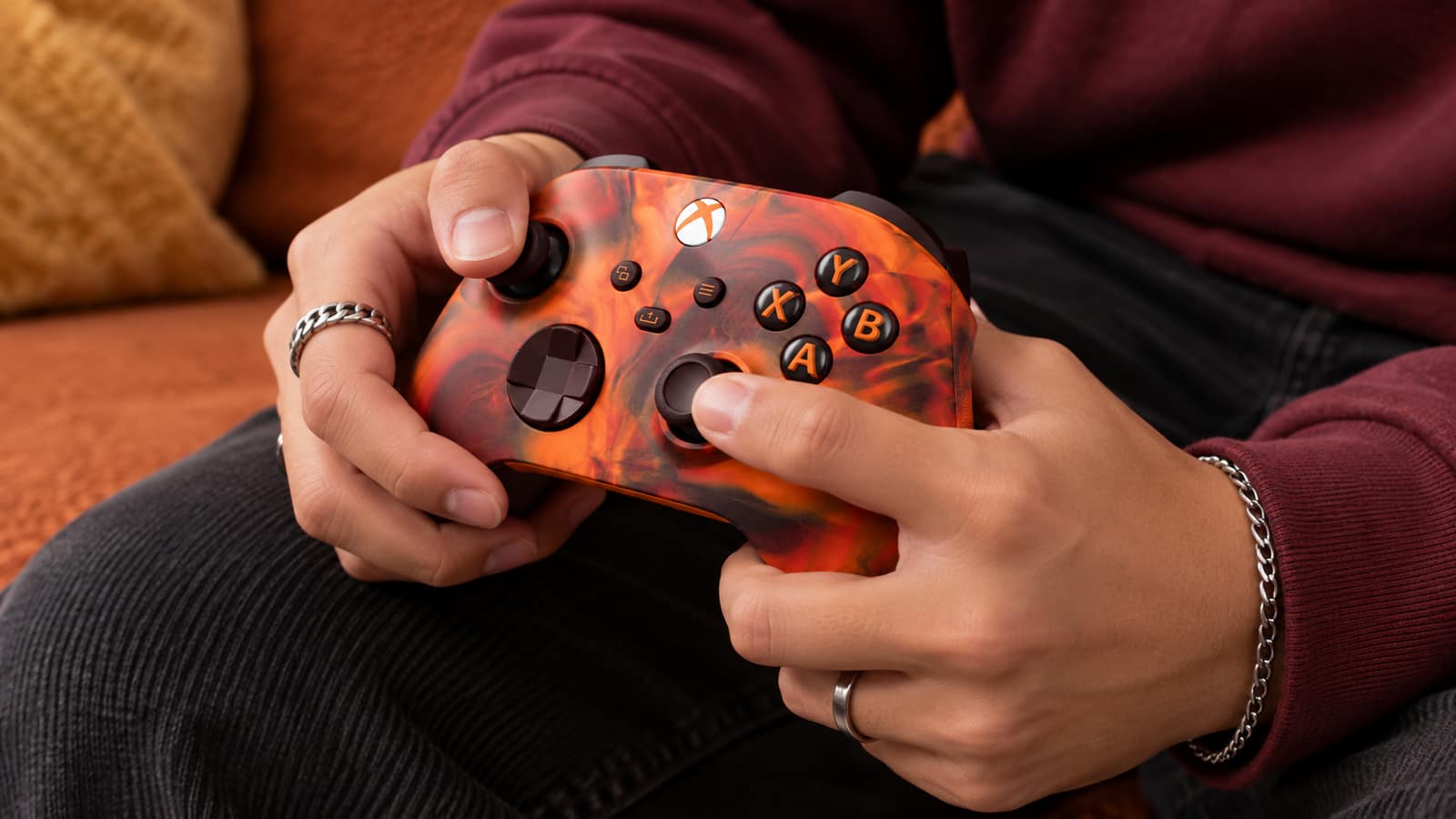 Person gaming with Xbox Fire Vapor Special Edition controller