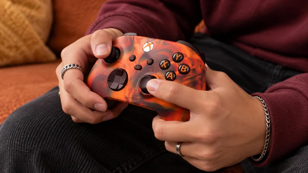 Person gaming with Xbox Fire Vapor Special Edition controller