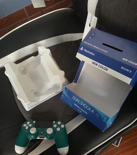 Click to view full screen Sony PlayStation DualShock 4 Wireless Controller for PlayStation 4 - Alpine. Green photo review