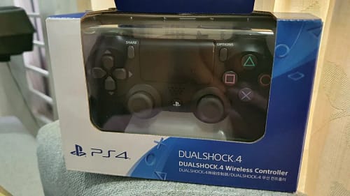 Click to view full screen Sony PlayStation DualShock 4 Wireless Controller for PlayStation 4 - Black photo review